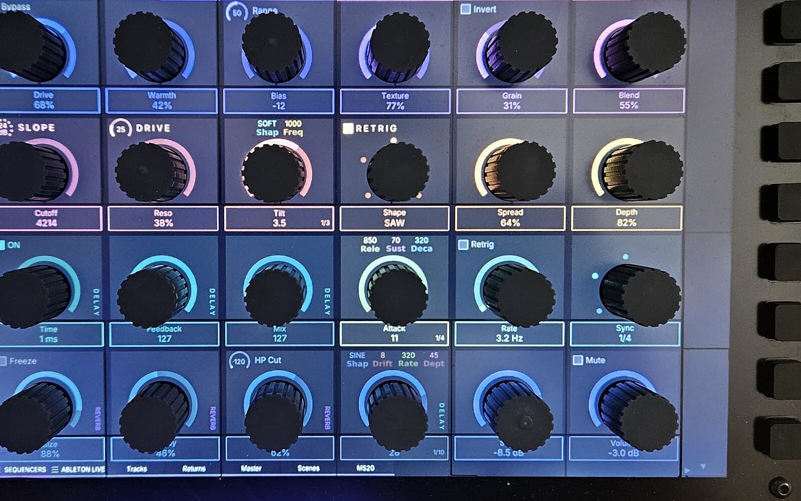 Close-up of knurled knobs on the display, each with its own label and value