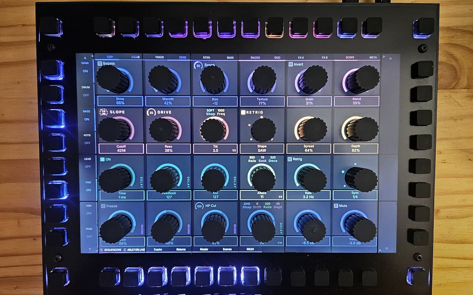 KARL seen from the front: 24 knobs sitting on the display, surrounded by backlit switches